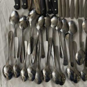 80 piece mixed flatware lot. Spoons, knives, forks