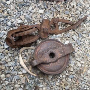 vintage fence stretcher and pulley? Rusty Metal Yard Art