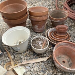 Mix of terracotta pots, dip trays, and others