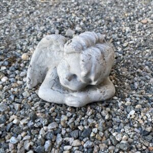 Little resting angel statue yard art